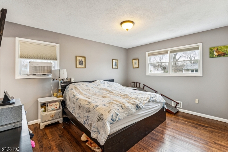 7 Overbrook Road Flanders, NJ 07836 - Photo 20 of 32 a bedroom with a bed and wooden floor