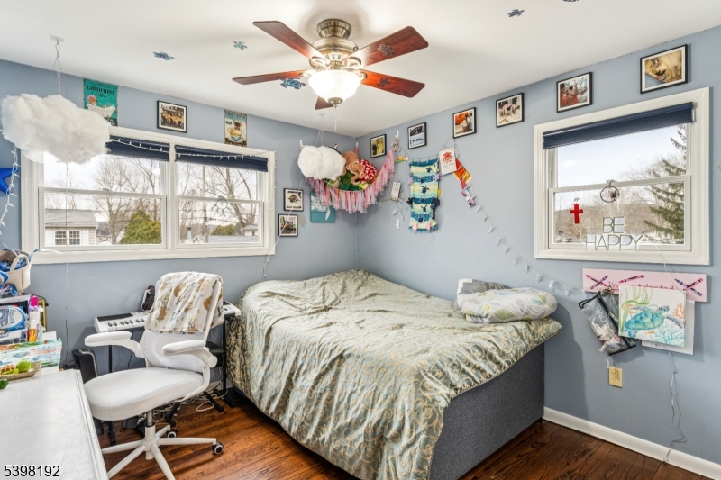 7 Overbrook Road Flanders, NJ 07836 - Photo 23 of 32 a bedroom with a bed and wooden floor