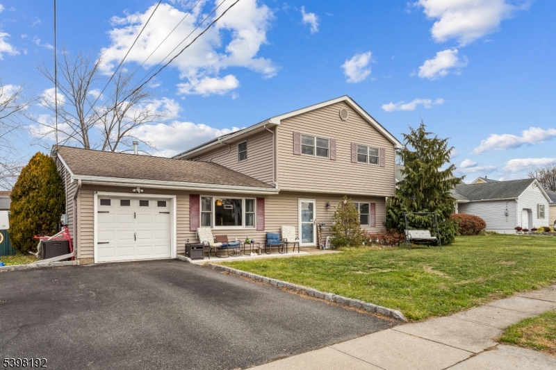 7 Overbrook Road Flanders, NJ 07836 - Photo 3 of 32 a front view of a house with a yard and garage