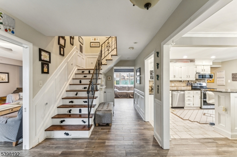 7 Overbrook Road Flanders, NJ 07836 - Photo 5 of 32 a view of a living room with white furniture and wooden floor