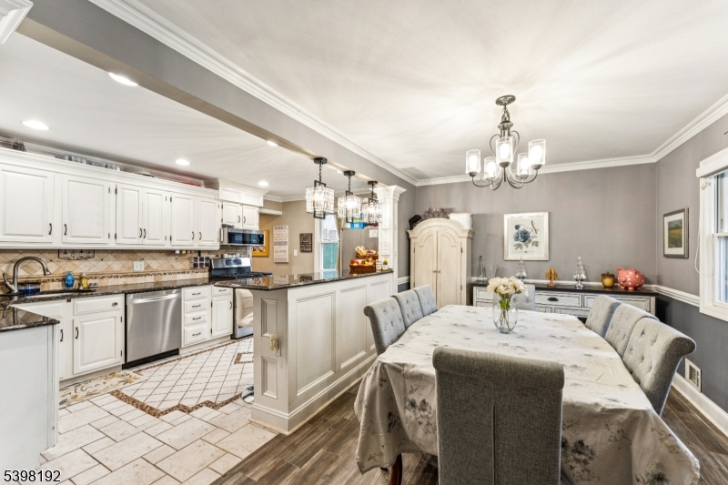 7 Overbrook Road Flanders, NJ 07836 - Photo 8 of 32 a large kitchen with stainless steel appliances kitchen island granite countertop a sink and cabinets