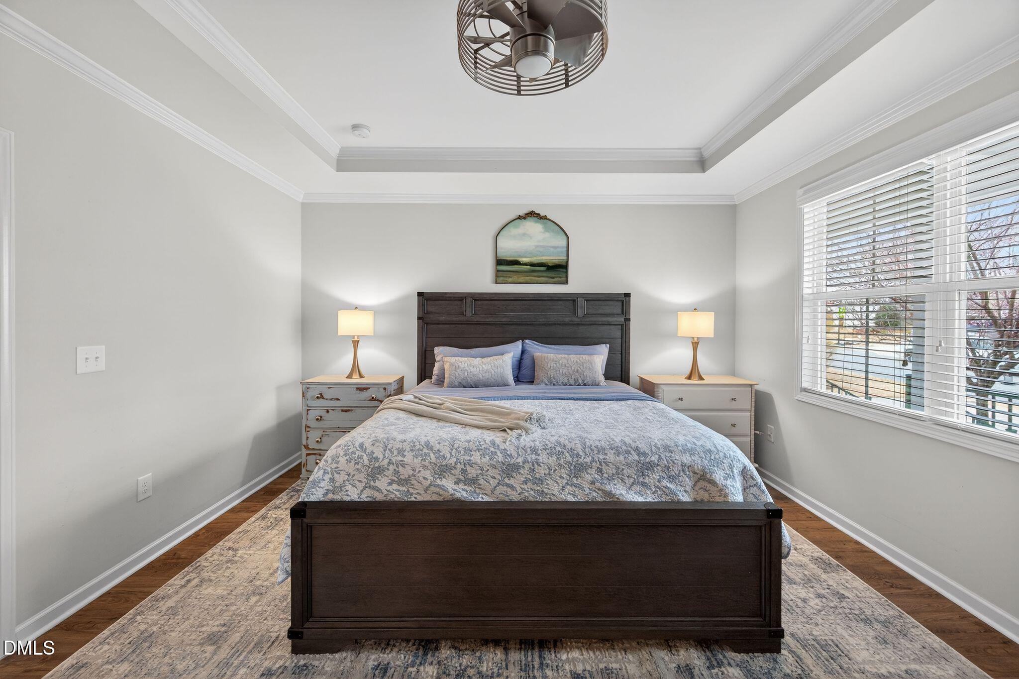 528 Spring Flower Court Cary, NC 27511 - Photo 22 of 51 a bedroom with a bed and a window