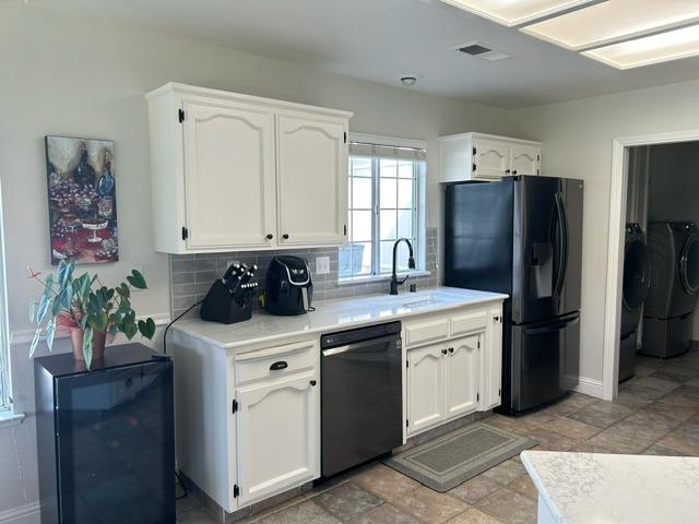 3046 Cypress Avenue Clovis, CA 93611 - Photo 12 of 48 a kitchen with stainless steel appliances a stove a sink a refrigerator and a refrigerator