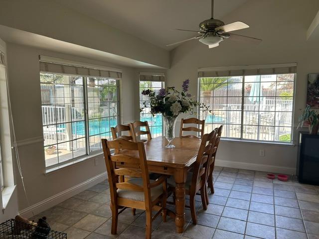 3046 Cypress Avenue Clovis, CA 93611 - Photo 13 of 48 a view of a dining room with furniture window and outside view