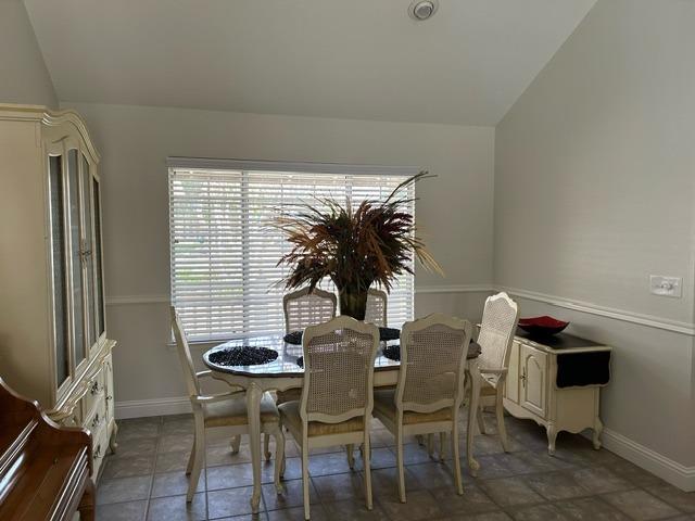 3046 Cypress Avenue Clovis, CA 93611 - Photo 16 of 48 a view of a dining room with furniture and window