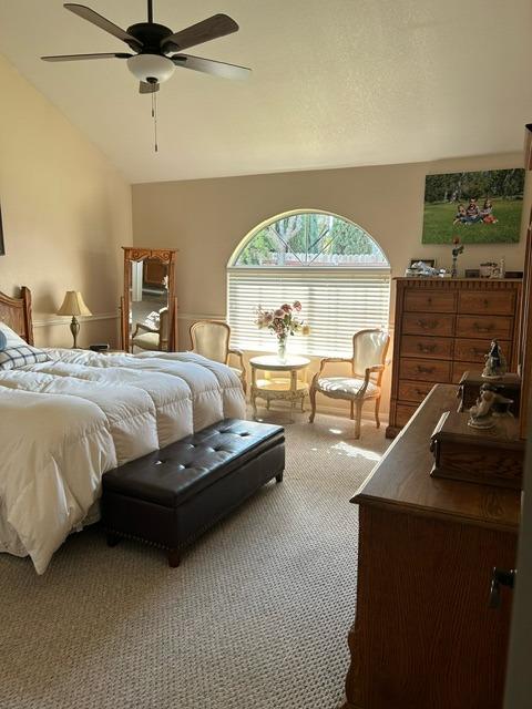 3046 Cypress Avenue Clovis, CA 93611 - Photo 32 of 48 a spacious bedroom with a bed and a table