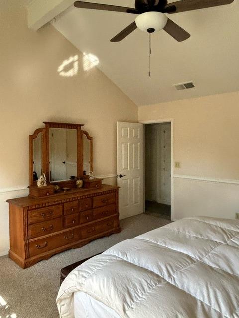 3046 Cypress Avenue Clovis, CA 93611 - Photo 33 of 48 a bedroom with a bed and a mirror on dresser