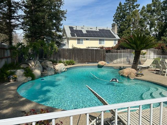 3046 Cypress Avenue Clovis, CA 93611 - Photo 39 of 48 a view of a backyard with sitting area