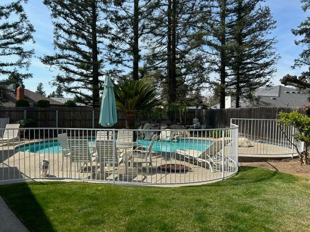 3046 Cypress Avenue Clovis, CA 93611 - Photo 41 of 48 a view of a park with slide