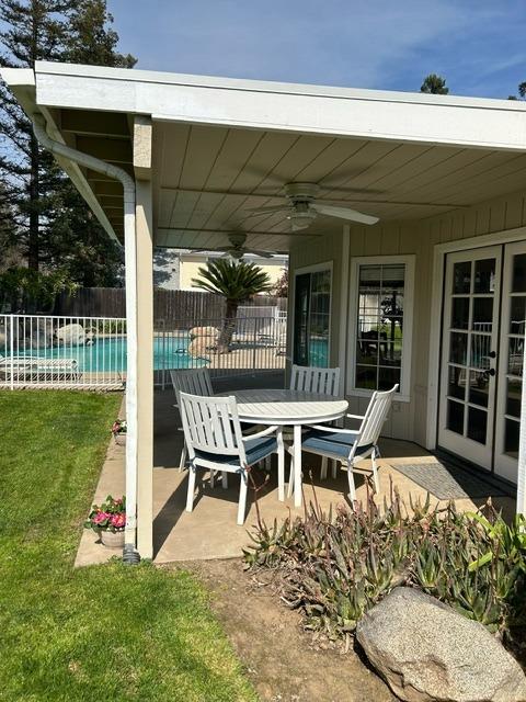 3046 Cypress Avenue Clovis, CA 93611 - Photo 45 of 48 a view of a chairs and table in patio with a yard