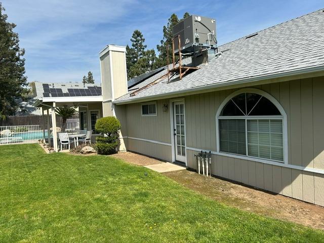 3046 Cypress Avenue Clovis, CA 93611 - Photo 47 of 48 a view of a house with backyard porch and sitting area