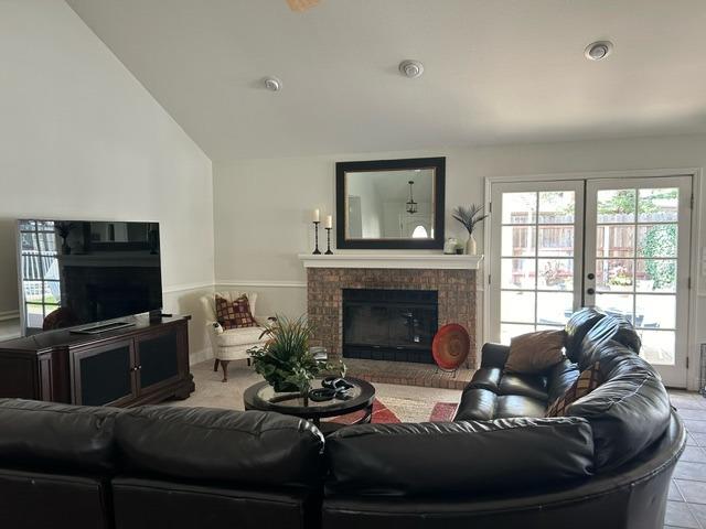 3046 Cypress Avenue Clovis, CA 93611 - Photo 7 of 48 a living room with furniture and a fireplace