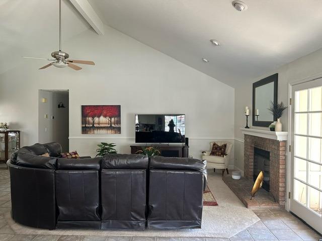3046 Cypress Avenue Clovis, CA 93611 - Photo 8 of 48 a living room with furniture and a flat screen tv