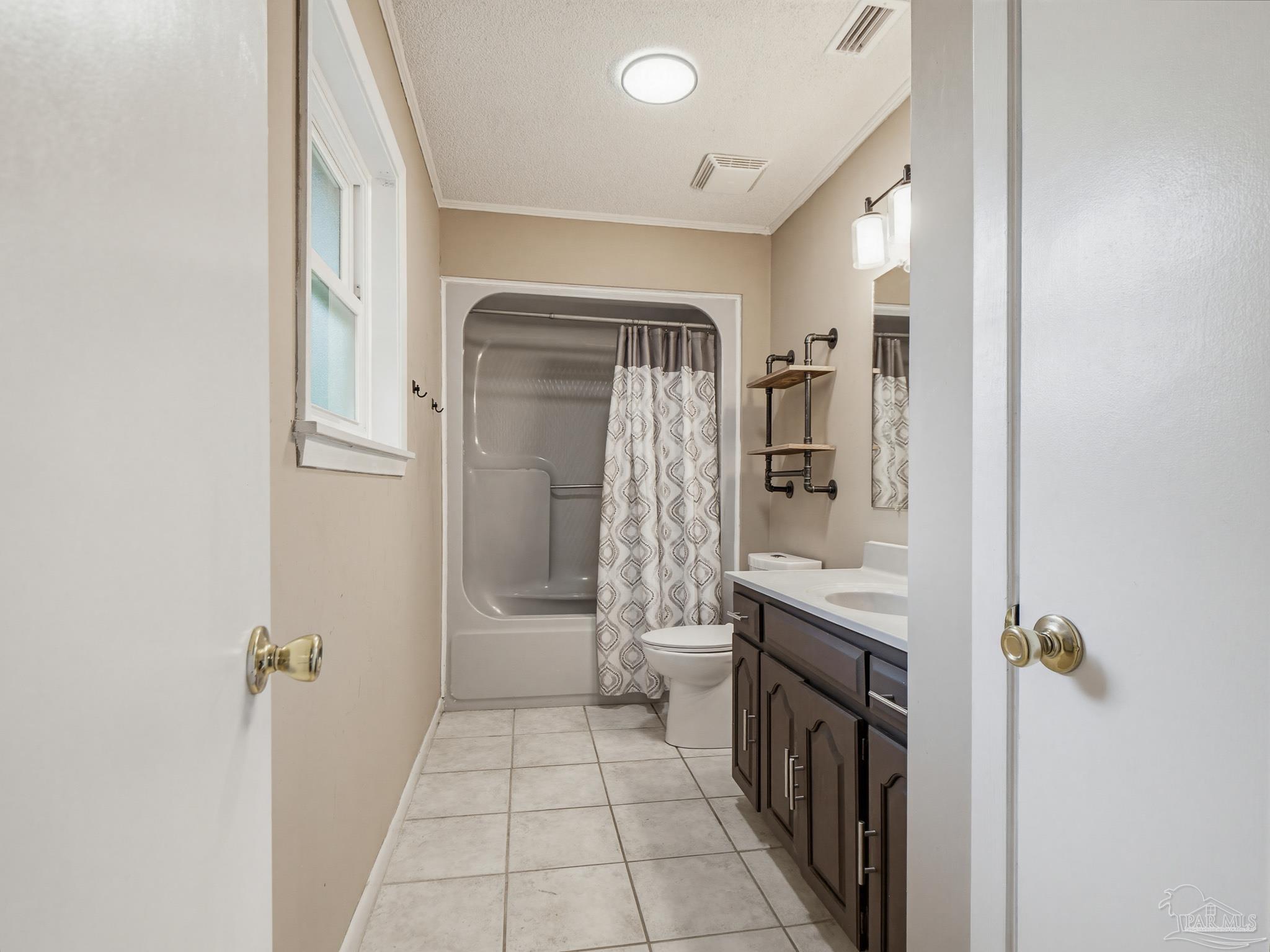 4940 Dawson Road Century, FL 32535 - Photo 59 of 62 a bathroom with a sink a toilet and shower