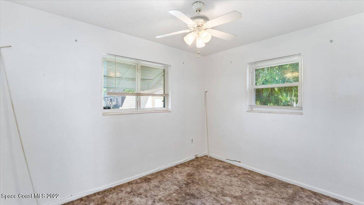2914 Stetson Street Melbourne, FL 32901 - Photo 15 of 22 an empty room with a window