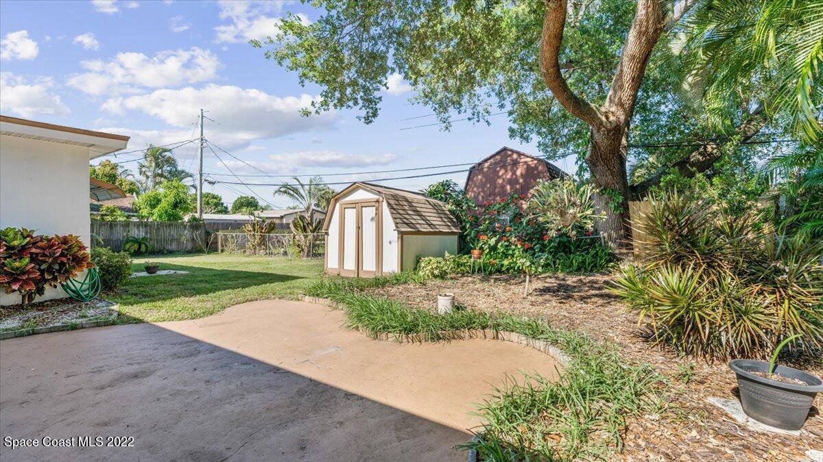 2914 Stetson Street Melbourne, FL 32901 - Photo 20 of 22 a view of a garden with a pathway
