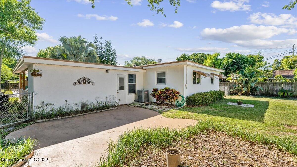 2914 Stetson Street Melbourne, FL 32901 - Photo 21 of 22 a view of a house with backyard and garden