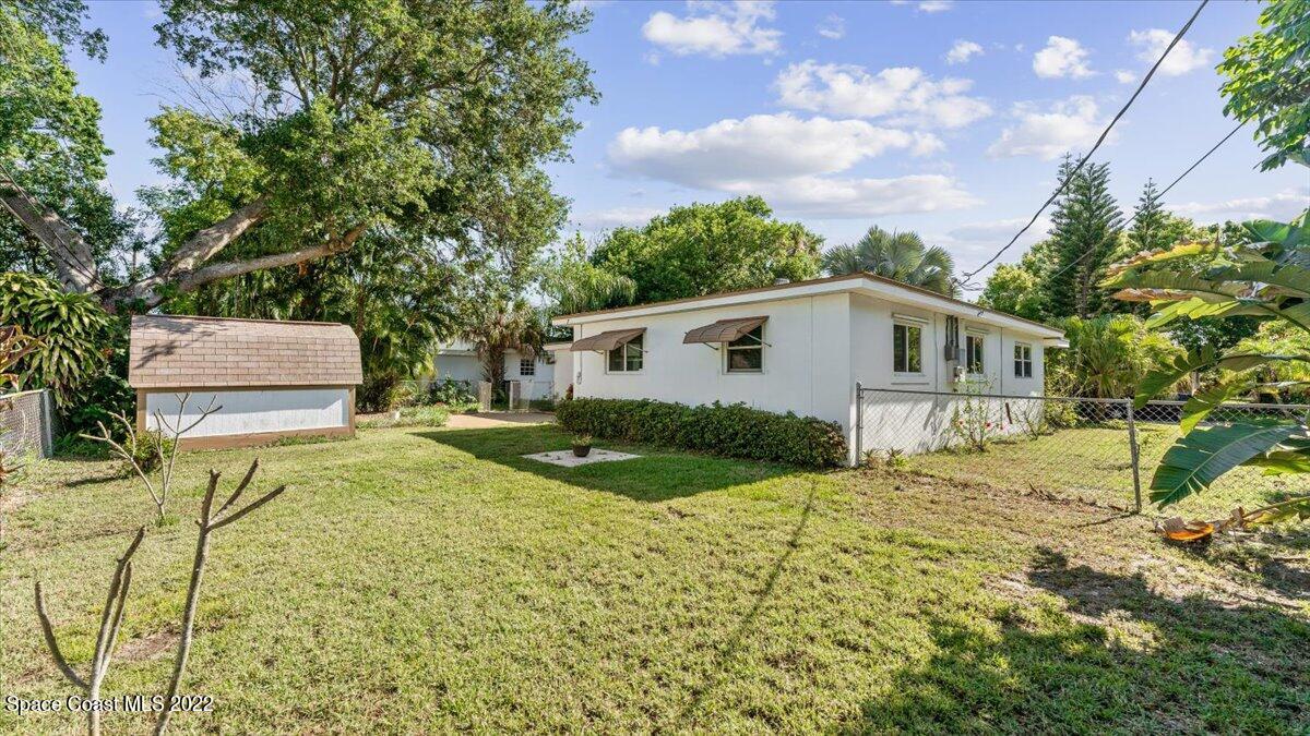 2914 Stetson Street Melbourne, FL 32901 - Photo 22 of 22 a view of a house with a yard