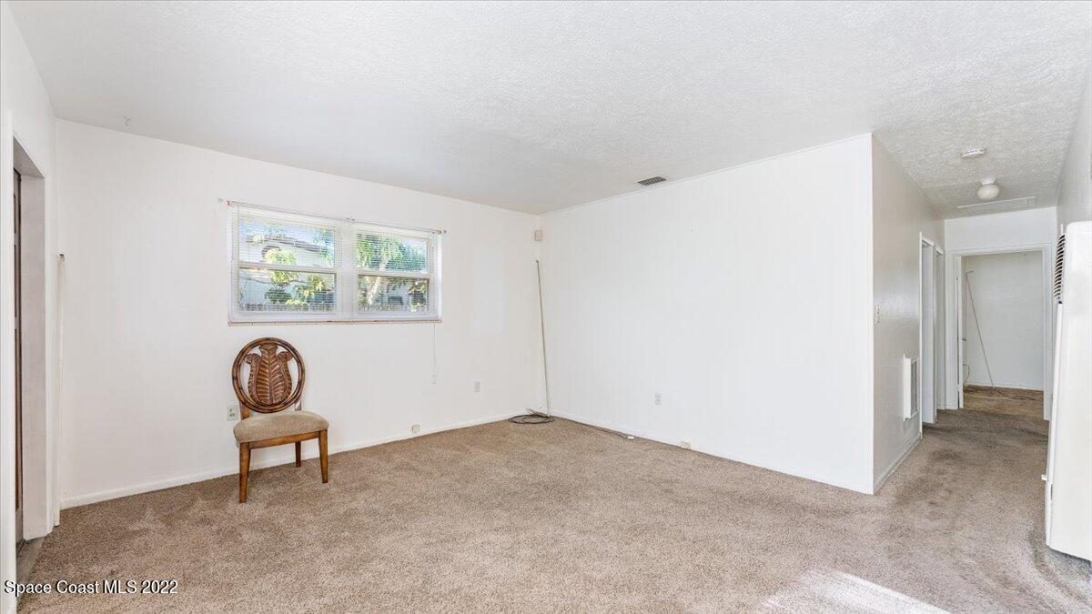 2914 Stetson Street Melbourne, FL 32901 - Photo 7 of 22 a living room with furniture and windows
