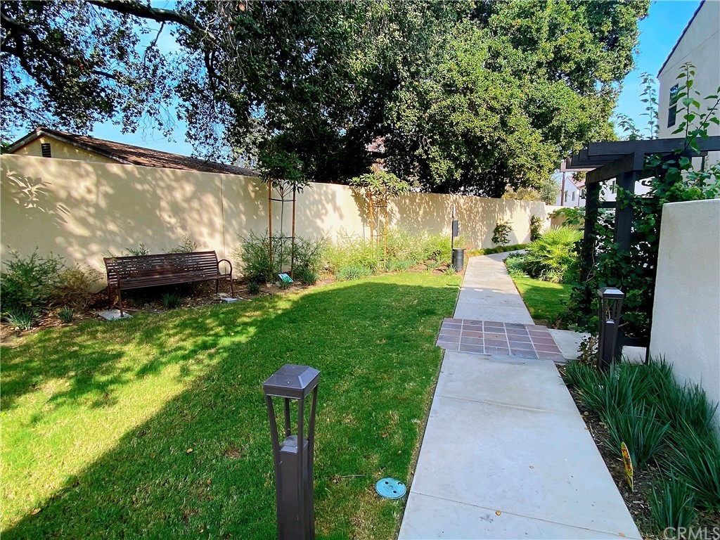 35 Bedford Court Arcadia, CA 91007 - Photo 12 of 15 a backyard of a house with lots of green space