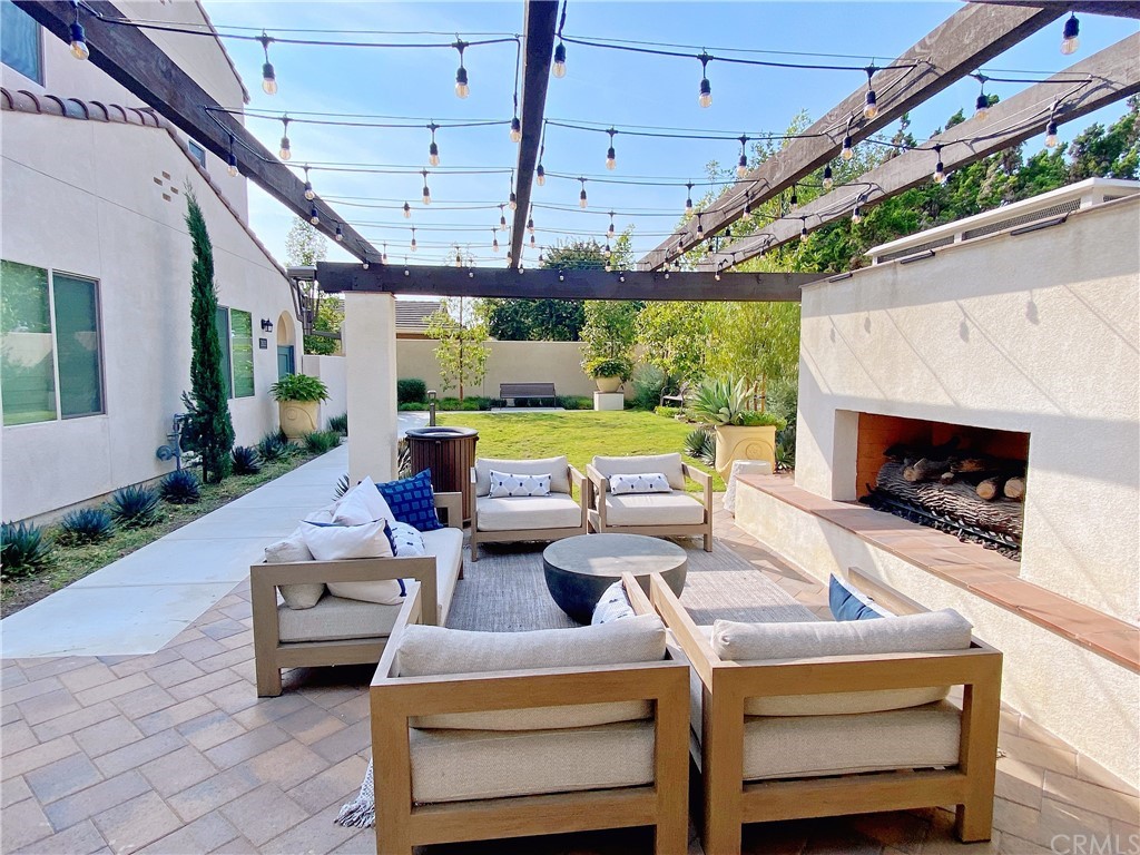 35 Bedford Court Arcadia, CA 91007 - Photo 13 of 15 a outdoor space with patio furniture and a fireplace