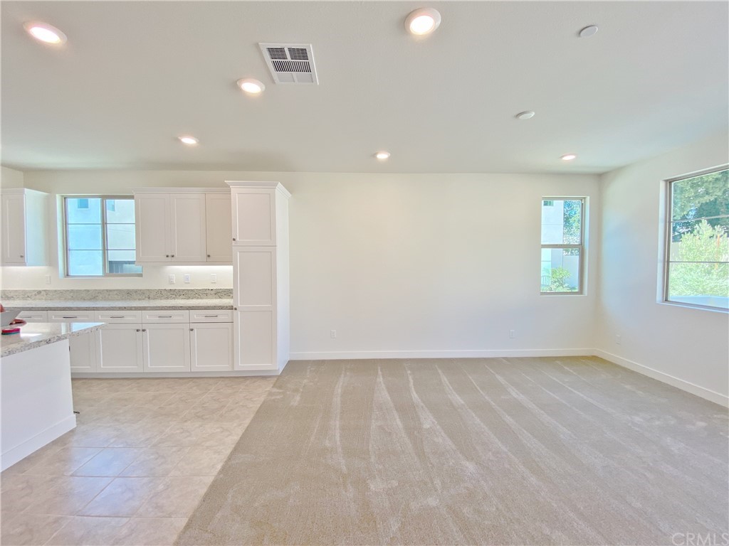 35 Bedford Court Arcadia, CA 91007 - Photo 5 of 15 a large white kitchen with a white cabinets