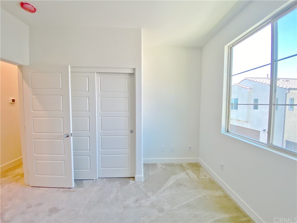 35 Bedford Court Arcadia, CA 91007 - Photo 8 of 15 an empty room with windows