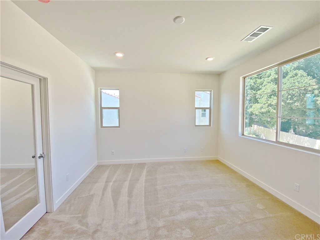 35 Bedford Court Arcadia, CA 91007 - Photo 9 of 15 an empty room with windows