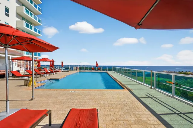 a view of swimming pool from a balcony