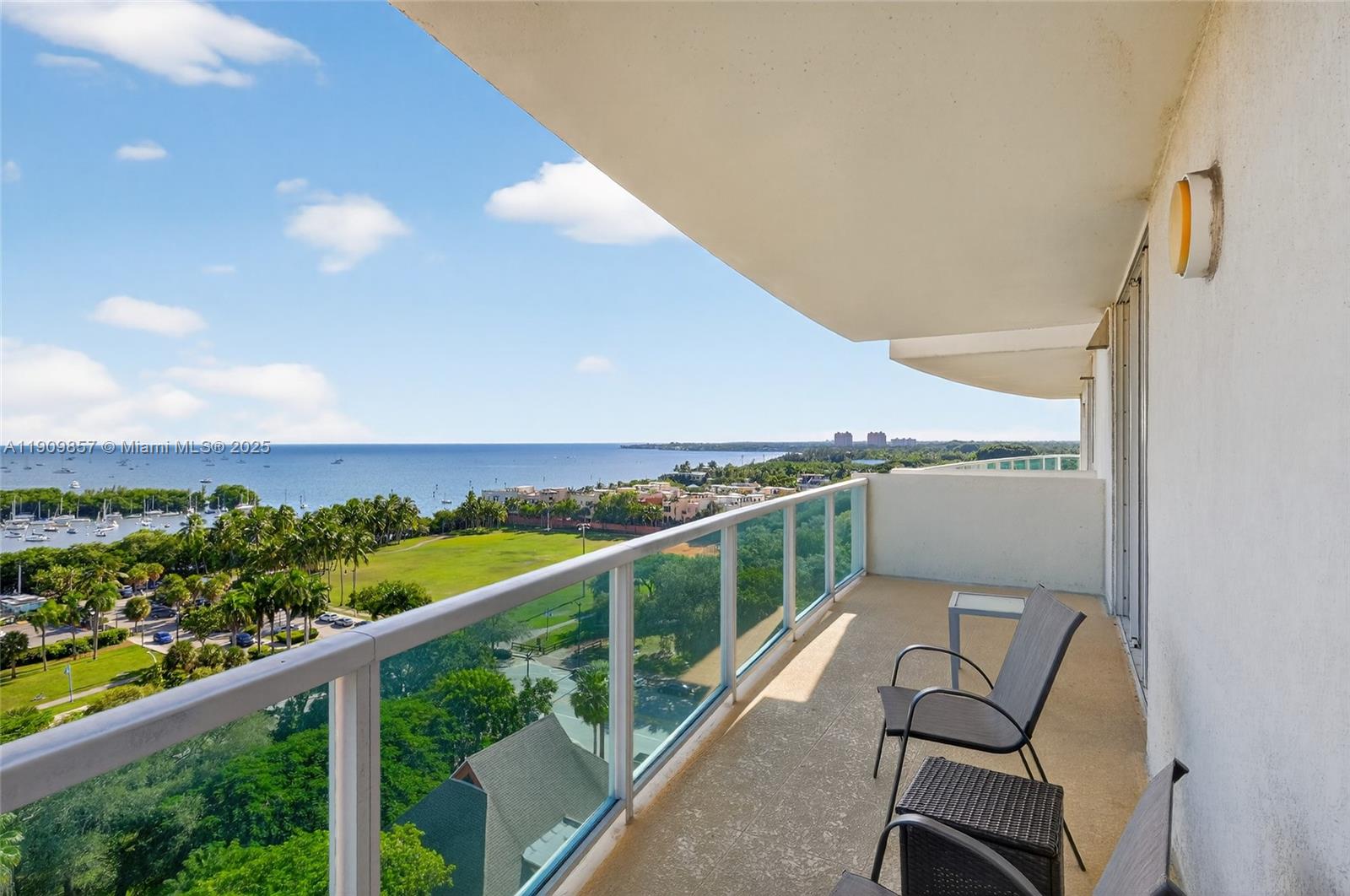 2889 McFarlane Road, Unit 1001 Miami, FL 33133 - Photo 3 of 35 a view of a balcony with an outdoor space