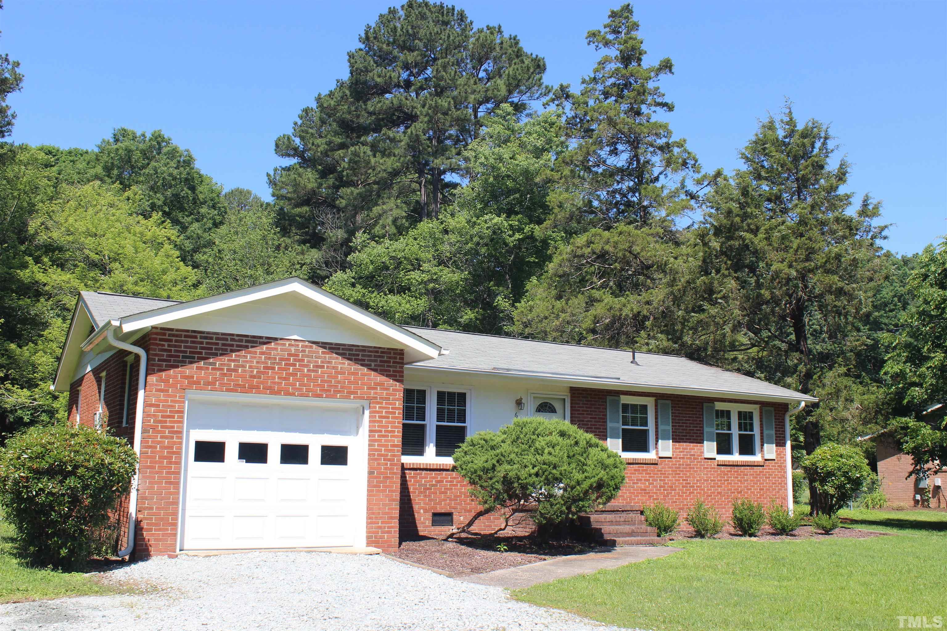 6907 Innesbrook Way Bahama, NC 27503 - Photo 1 of 17 front view of a house with a yard