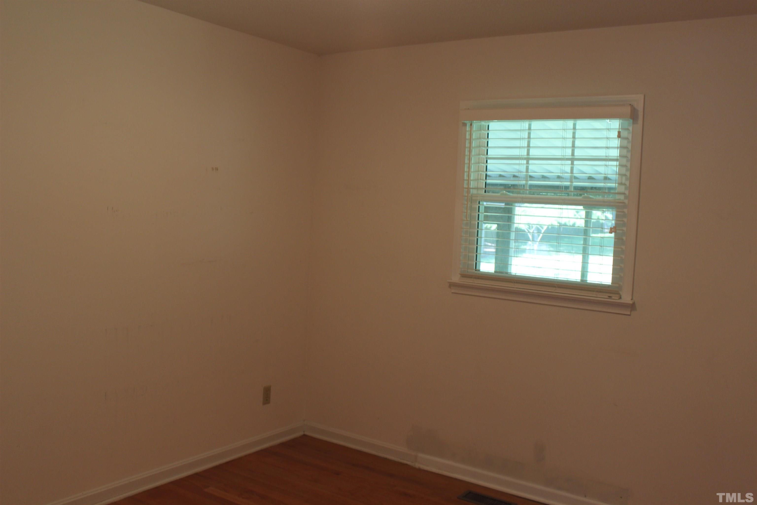 6907 Innesbrook Way Bahama, NC 27503 - Photo 8 of 17 an empty room with a window
