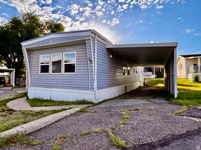 158 Cushing Way Layton, UT 84041 - Photo 1 of 14 Light blue horizontal siding facade with a contrasting white skirt