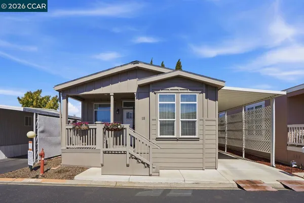 a front view of a house with a porch