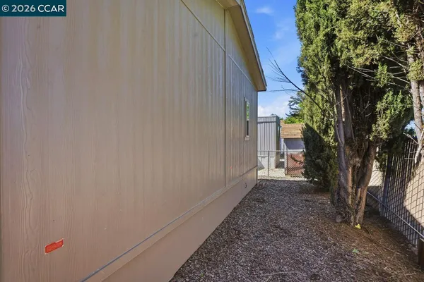 a view of a backyard with a trees