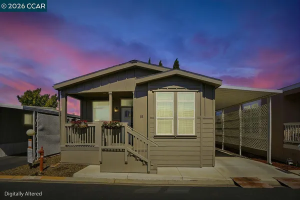 a front view of a house with a porch