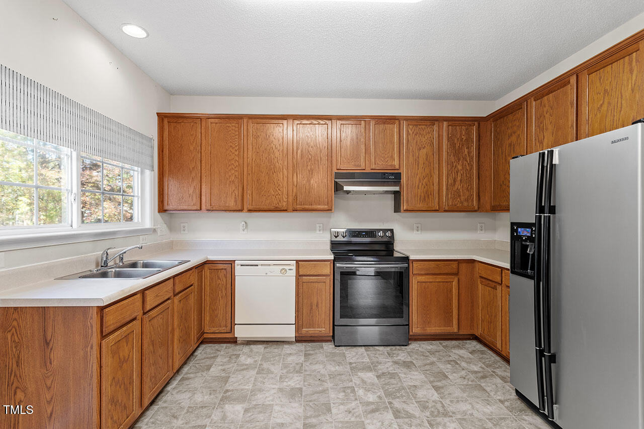 110 Caley Road Apex, NC 27502 - Photo 10 of 28 Kitchen with stainless steel range