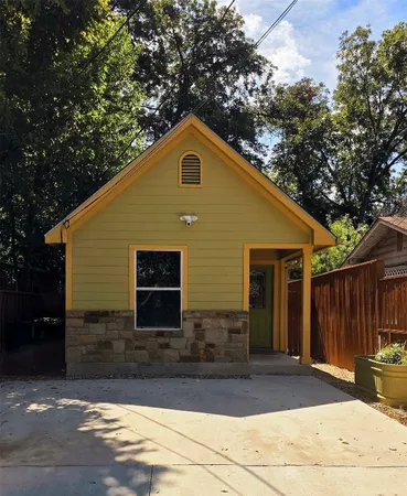 a front view of a house with garage