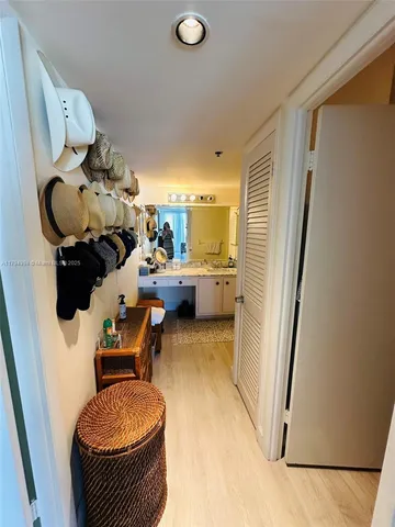 a room with furniture and a mirror