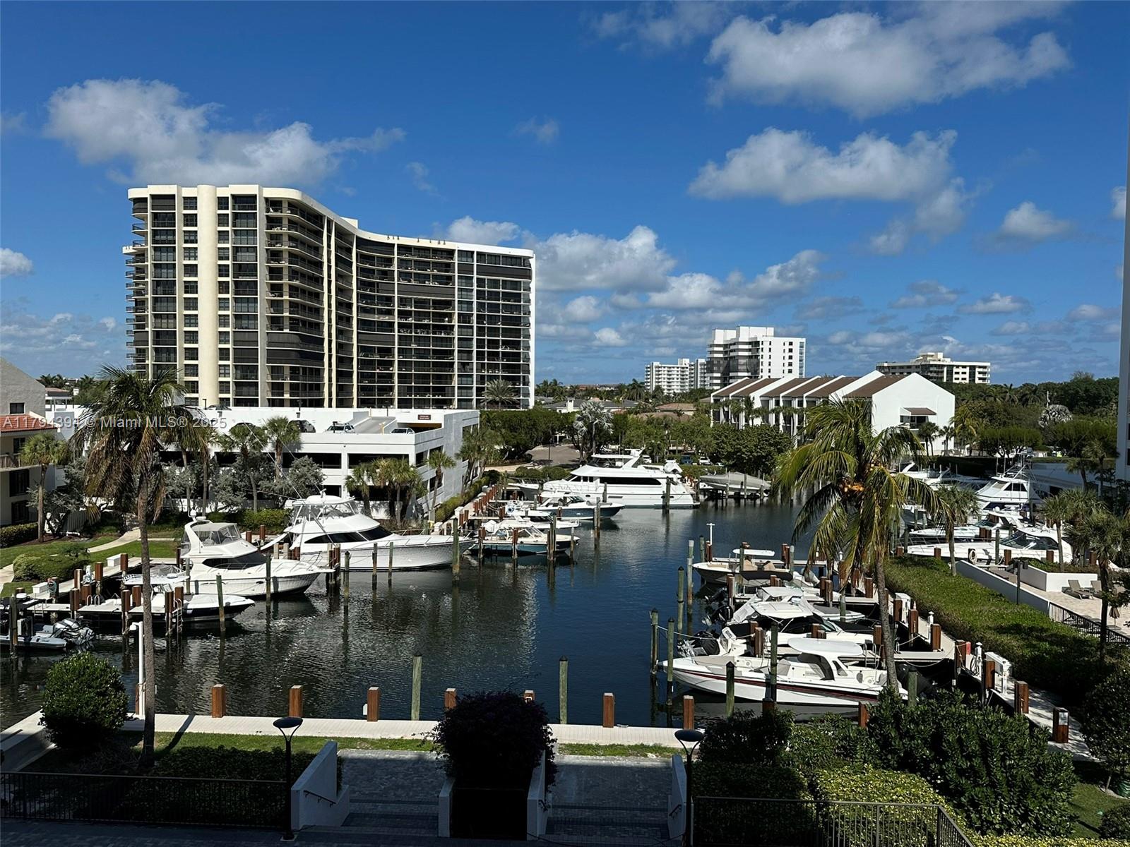 4750 South Ocean Boulevard, Unit 401 Highland Beach, FL 33487 - Photo 26 of 47 a view of a lake with a lot of buildings