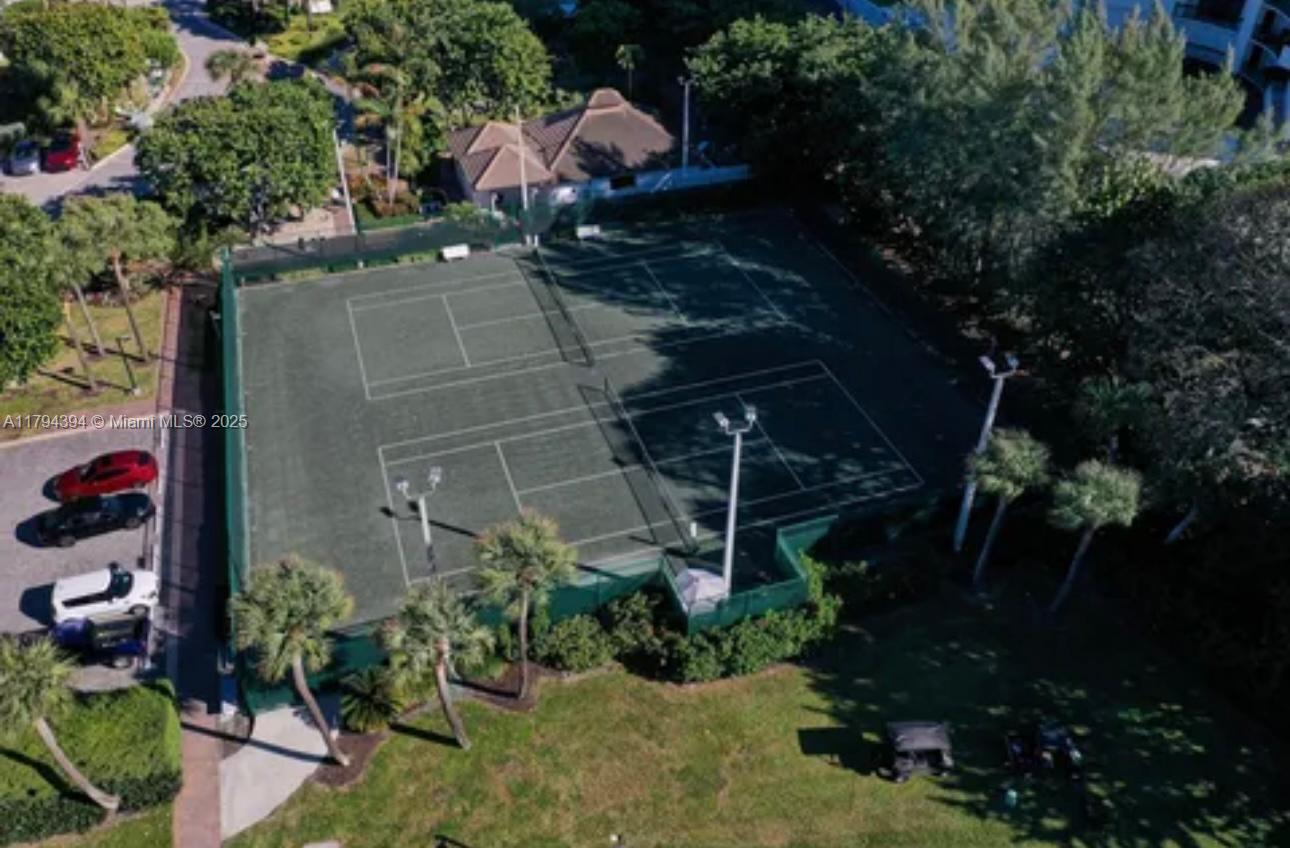 4750 South Ocean Boulevard, Unit 401 Highland Beach, FL 33487 - Photo 35 of 47 a backyard of a house with lots of green space