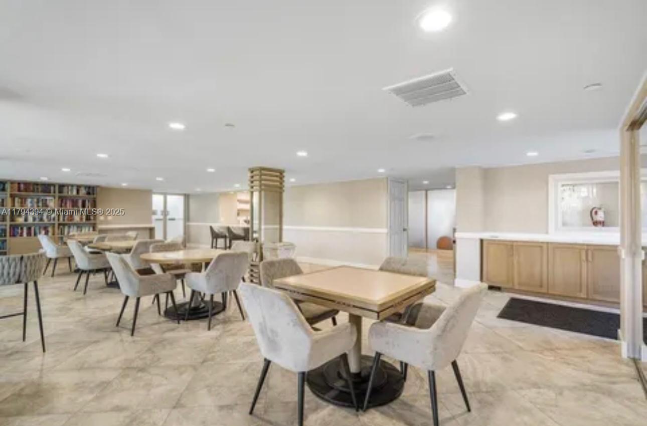 4750 South Ocean Boulevard, Unit 401 Highland Beach, FL 33487 - Photo 41 of 47 a view of a dining area with furniture