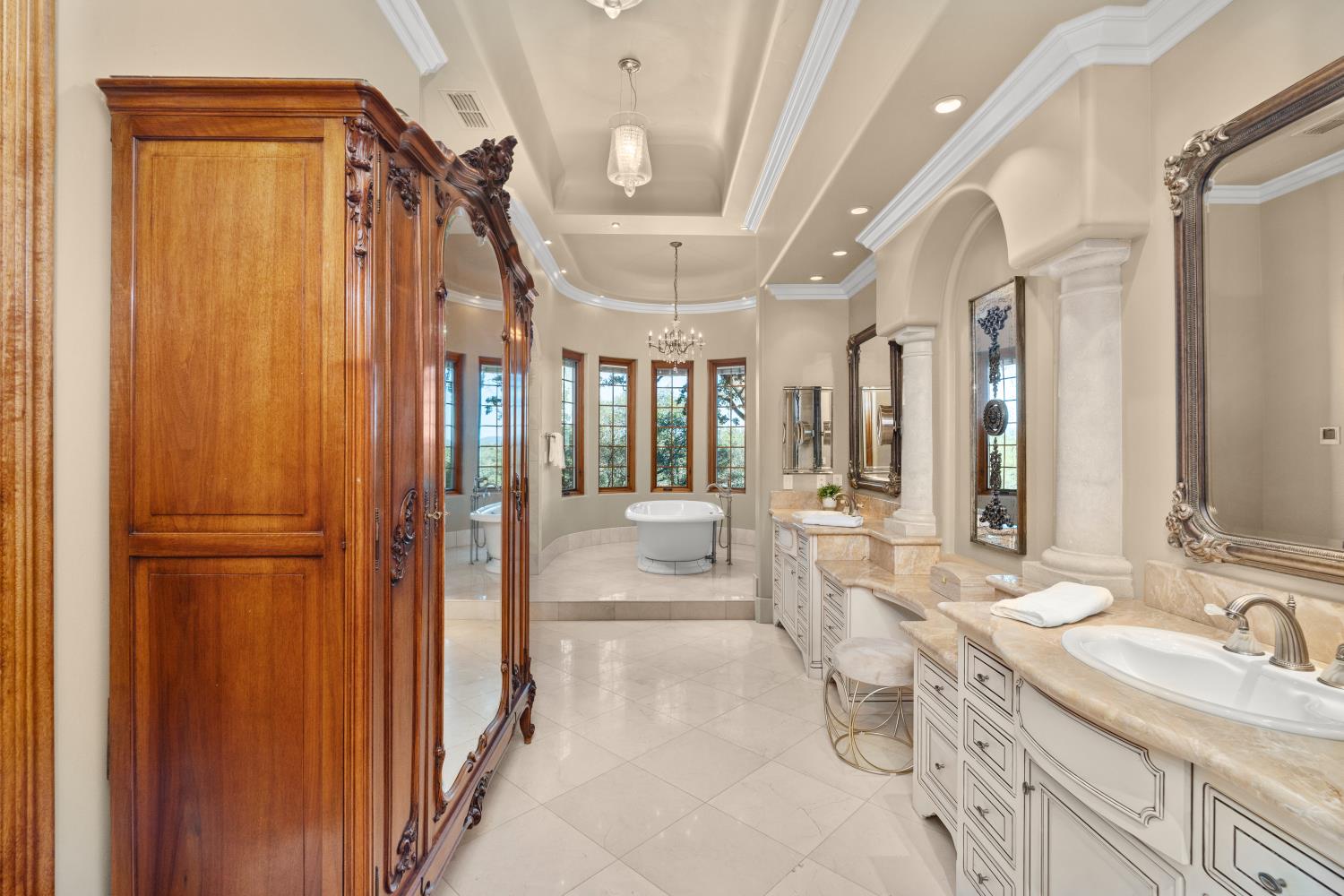 1100 Cold Springs Road Placerville, CA 95667 - Photo 39 of 97 Primary Bathroom - Spacious bathroom featuring dual vanities with integrated sinks, a freestanding bathtub, and a tray ceiling