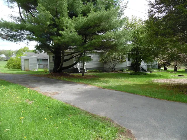 a view of a backyard with a garden