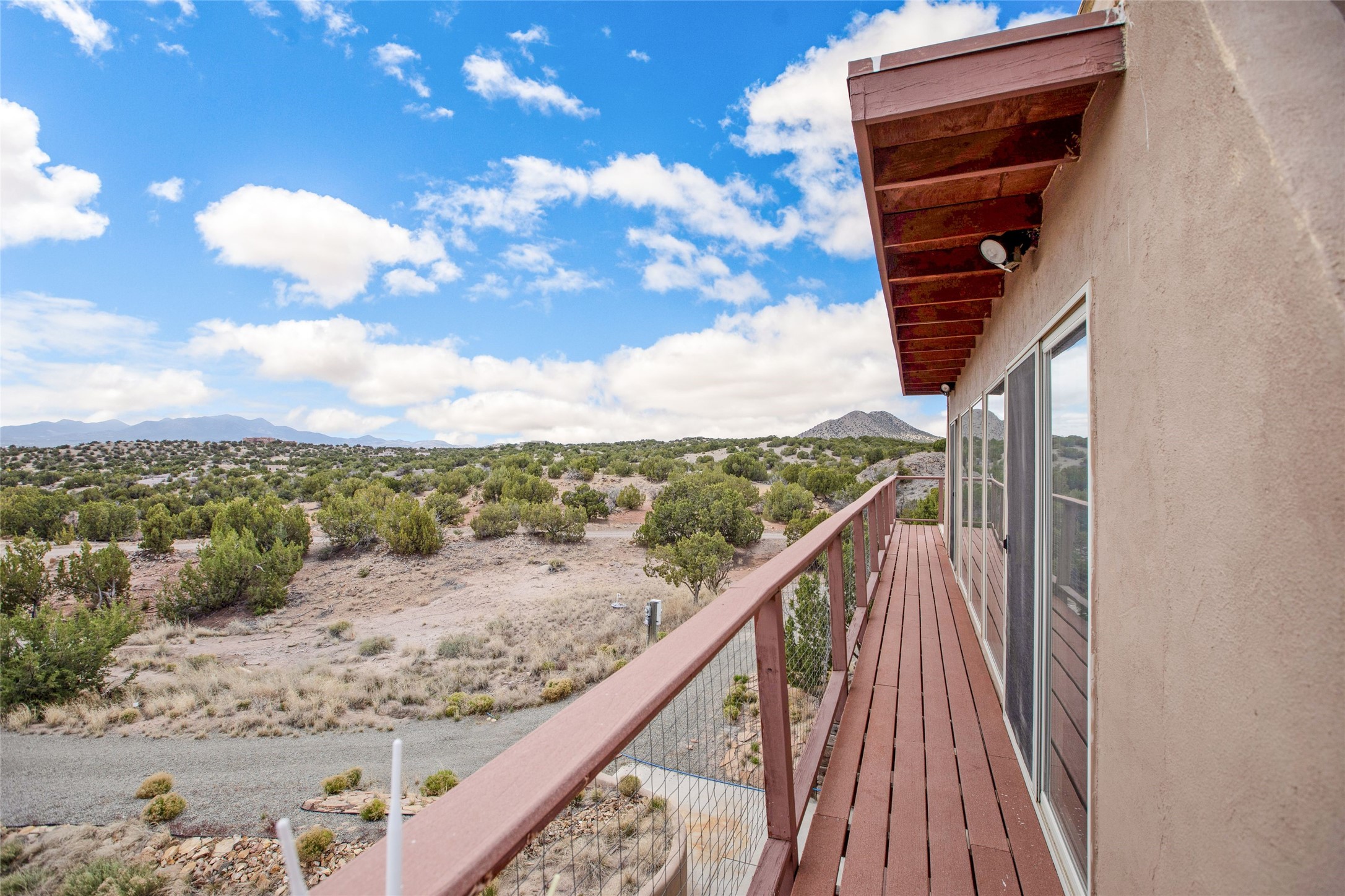 100 Rancho Alegre Road Santa Fe, NM 87508 - Photo 22 of 32 Primary Bedroom Balcony