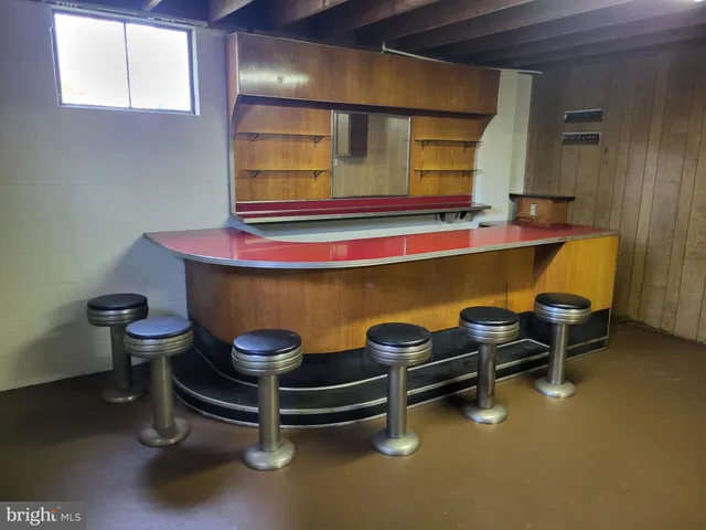 a room with chair and tables