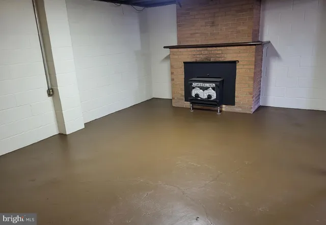 a living room with a fireplace
