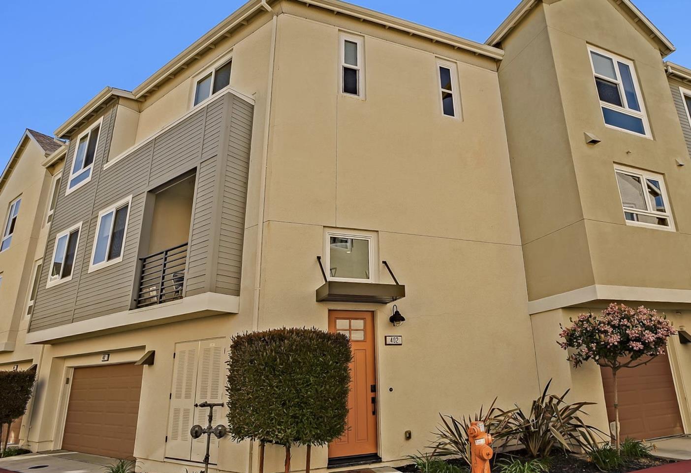 402 Neves Road San Mateo, CA 94403 - Photo 2 of 31 a front view of a house with a yard