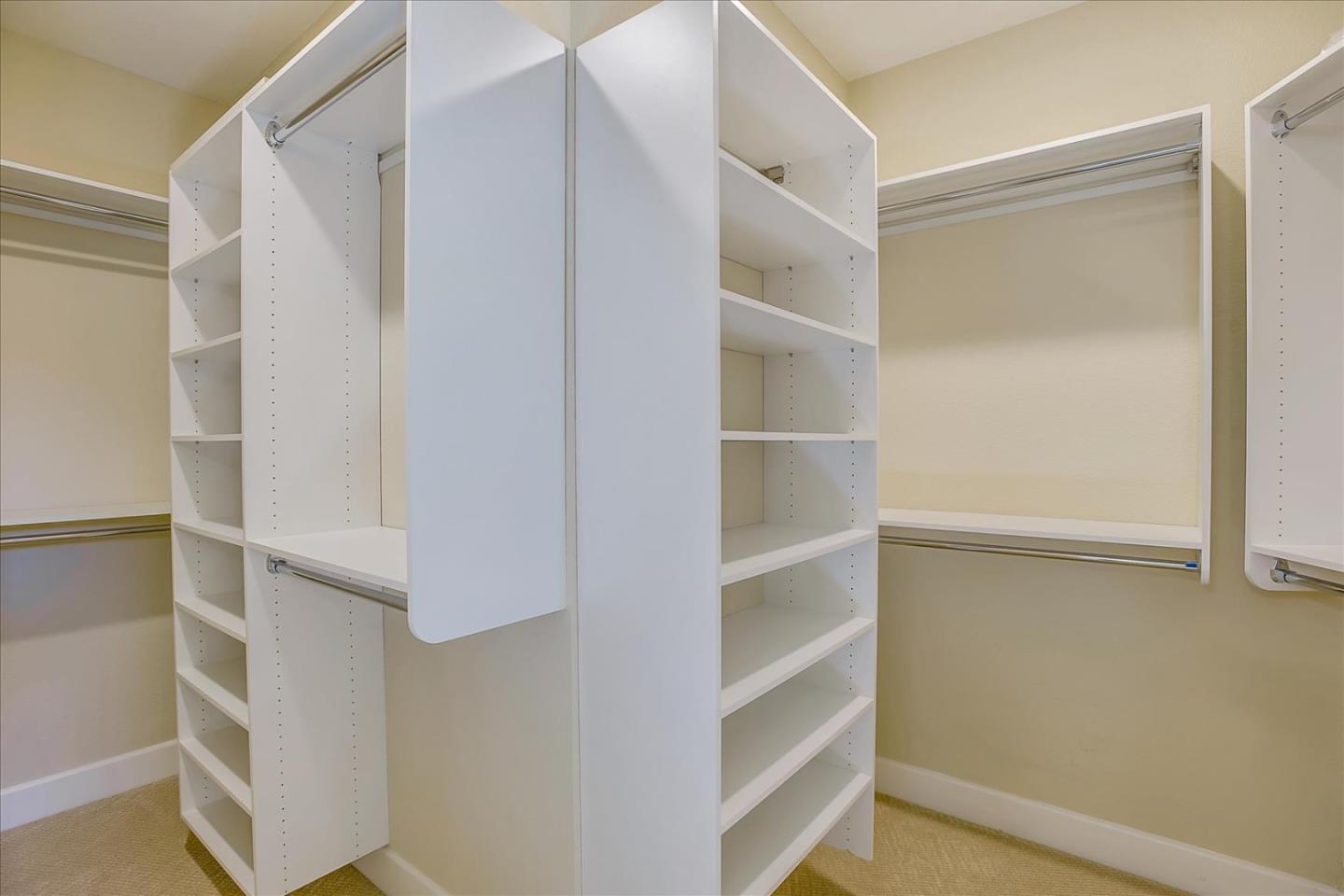 402 Neves Road San Mateo, CA 94403 - Photo 22 of 31 a view of walk in closet with empty racks