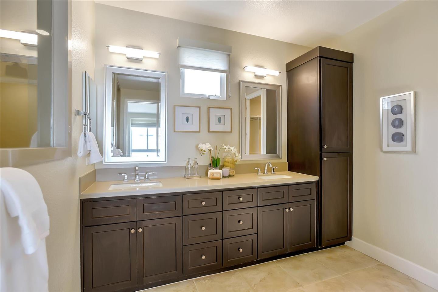 402 Neves Road San Mateo, CA 94403 - Photo 23 of 31 a bathroom with a granite countertop sink mirror and double